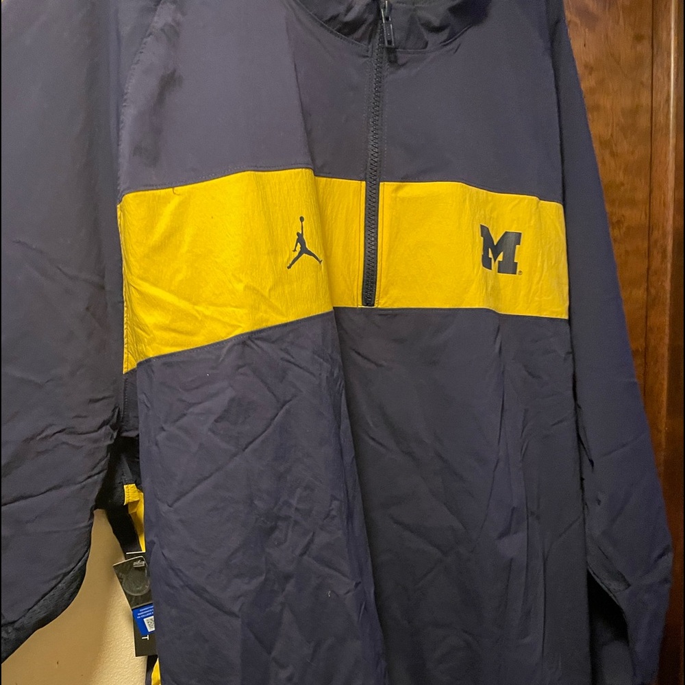 A Michigan pull over Jordan windbreaker
